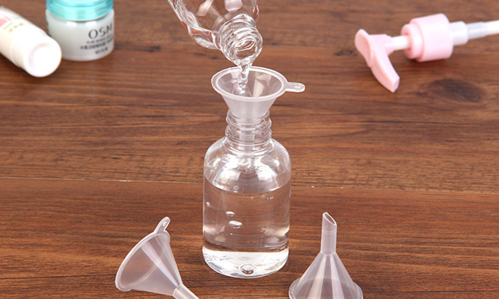 refill perfume bottle by funnel