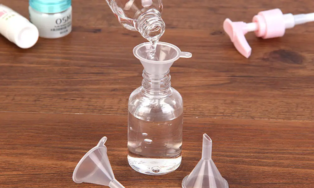 refill perfume bottle by funnel