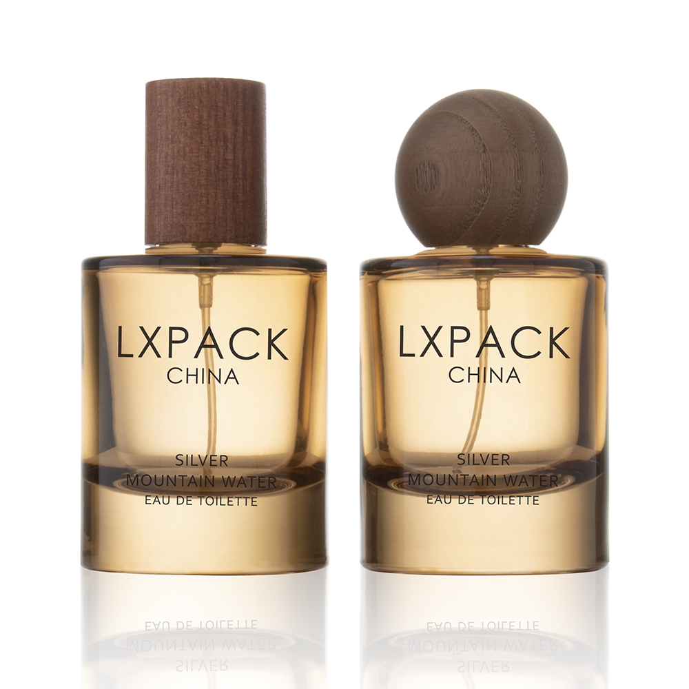 brown perfume bottle with wooden cap